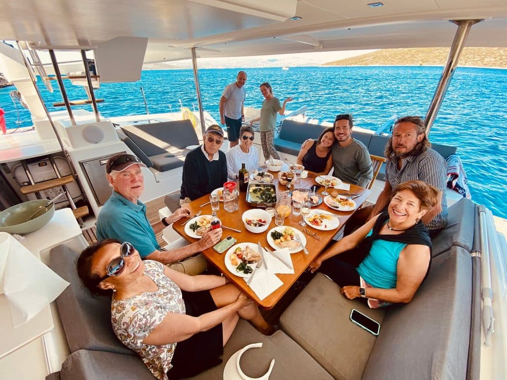 Family eating lunch on a catamaran in Croatia